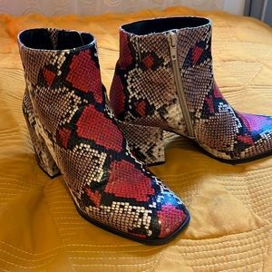 Leather snake skin python print ankle boots.